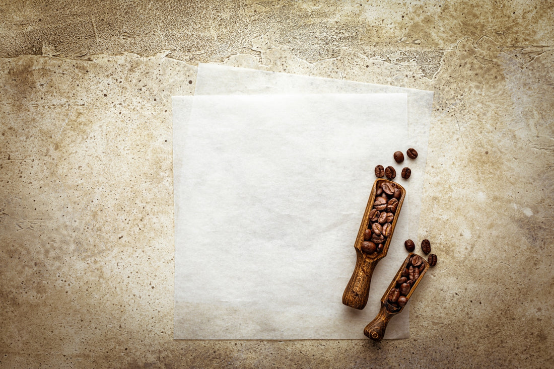 a piece of paper with some coffee beans on it