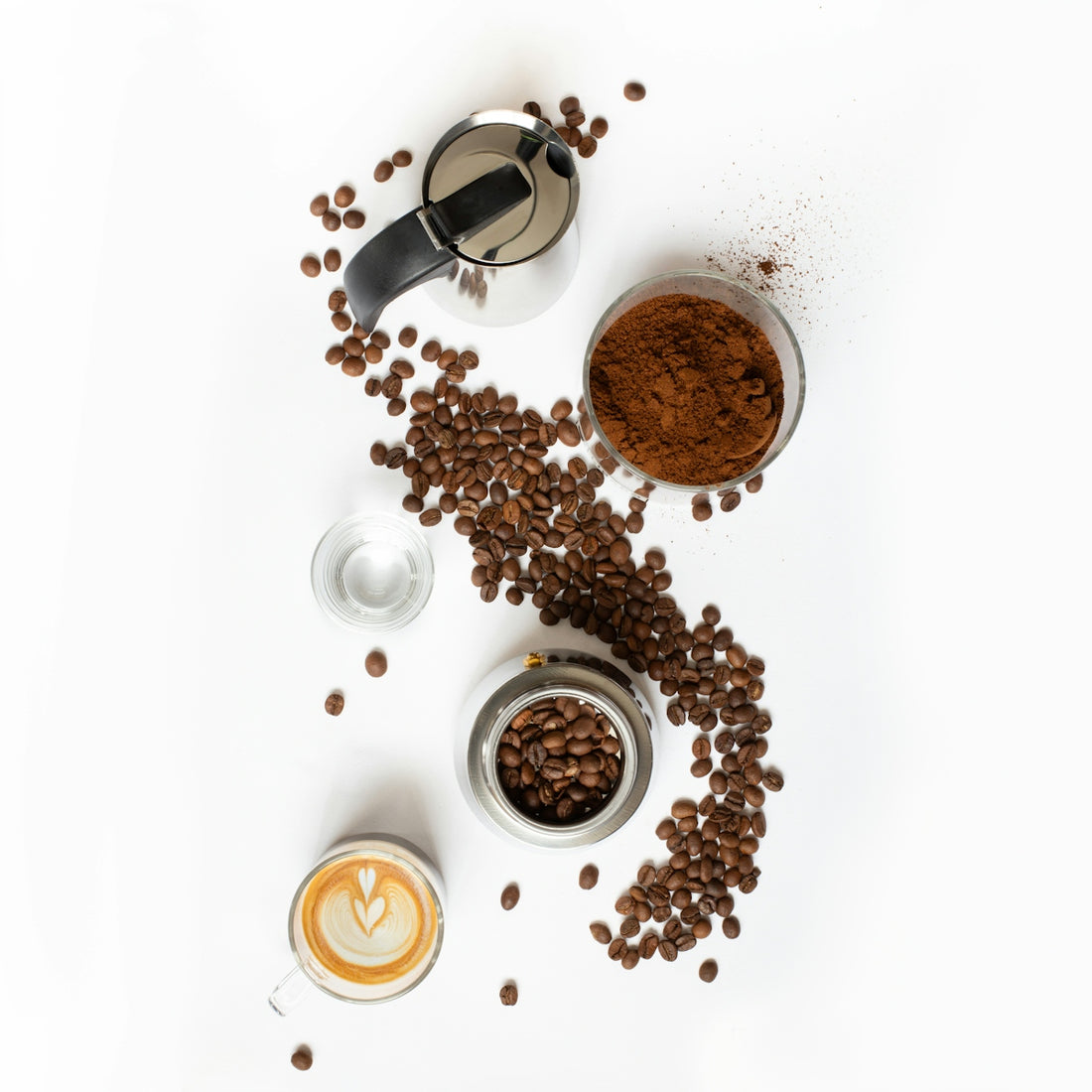 Coffee beans and latte art on a white background